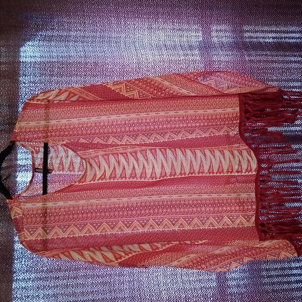 Pullover with Fringes @ the bottom very comfortable in excellent condition